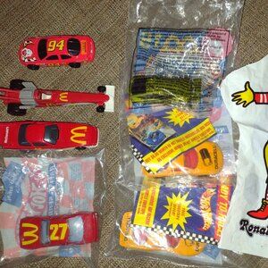 Seven race cars from McDonald's, Mattel Hot Wheels, Drag Racer